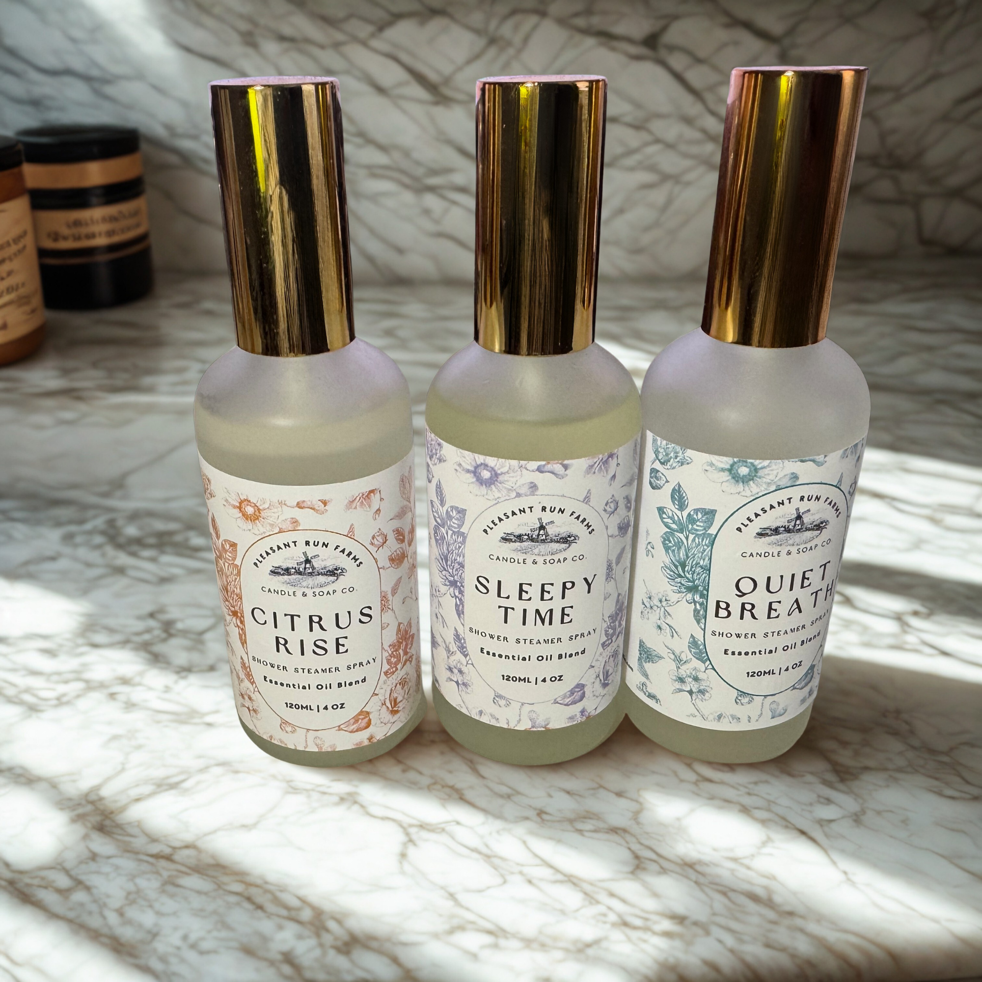 a set of 3 shower steamer sprays